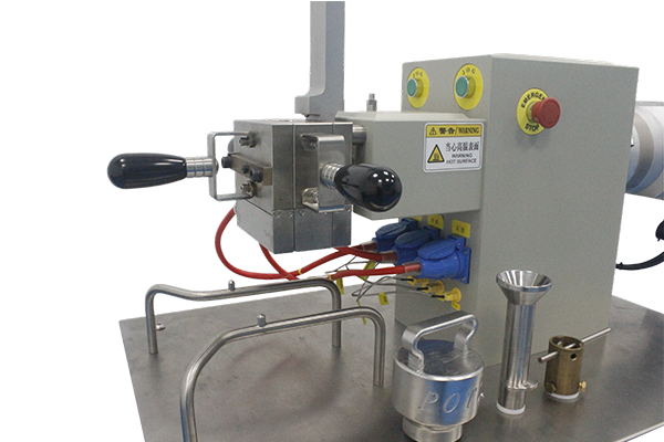 What is the role of a torque rheometer in polymer processing?